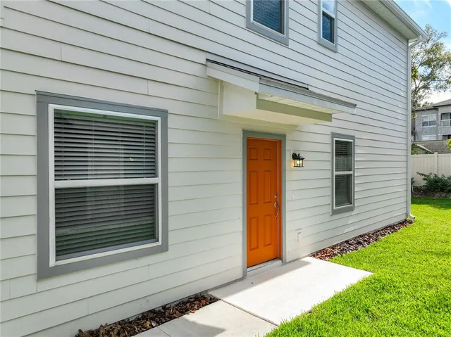a view of a back yard of the house