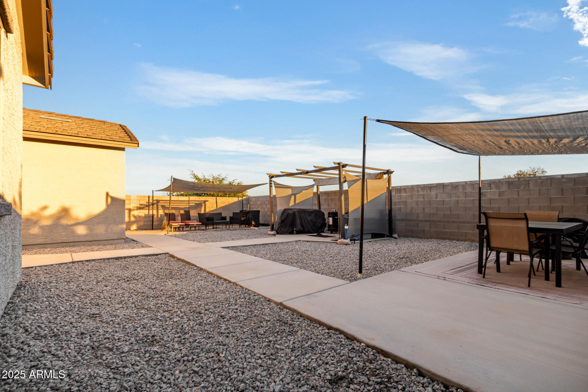 10637 West Crown King Road Tolleson, AZ 85353 - Photo 16 of 19 a view of a terrace with chairs
