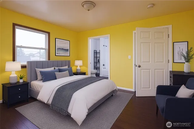 a spacious bedroom with a bed and a couch