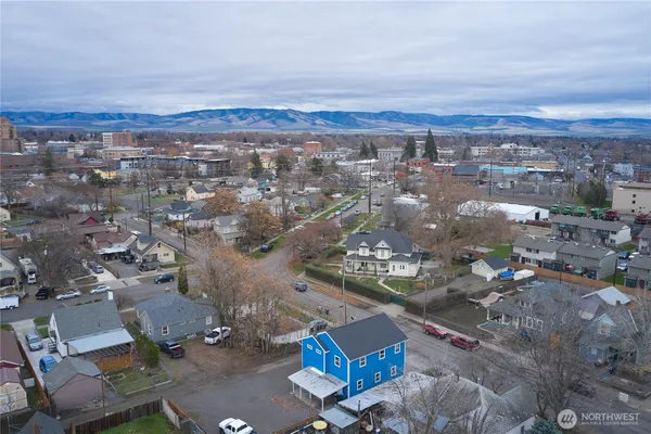 an aerial view of a city with lots of residential buildings
