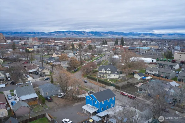 an aerial view of a city with lots of residential buildings