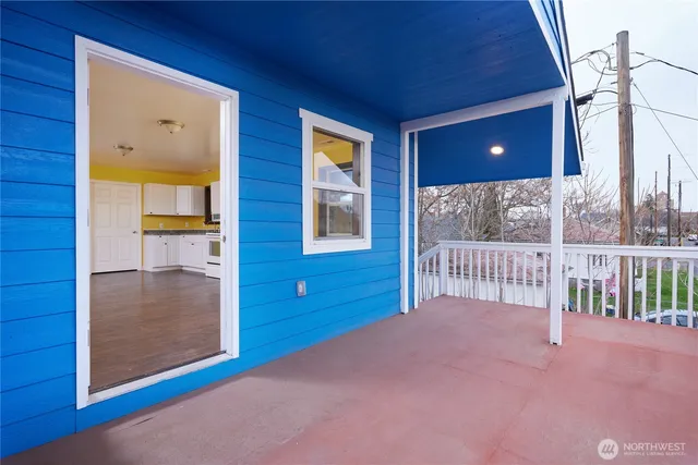 a view of a hallway with a bedroom