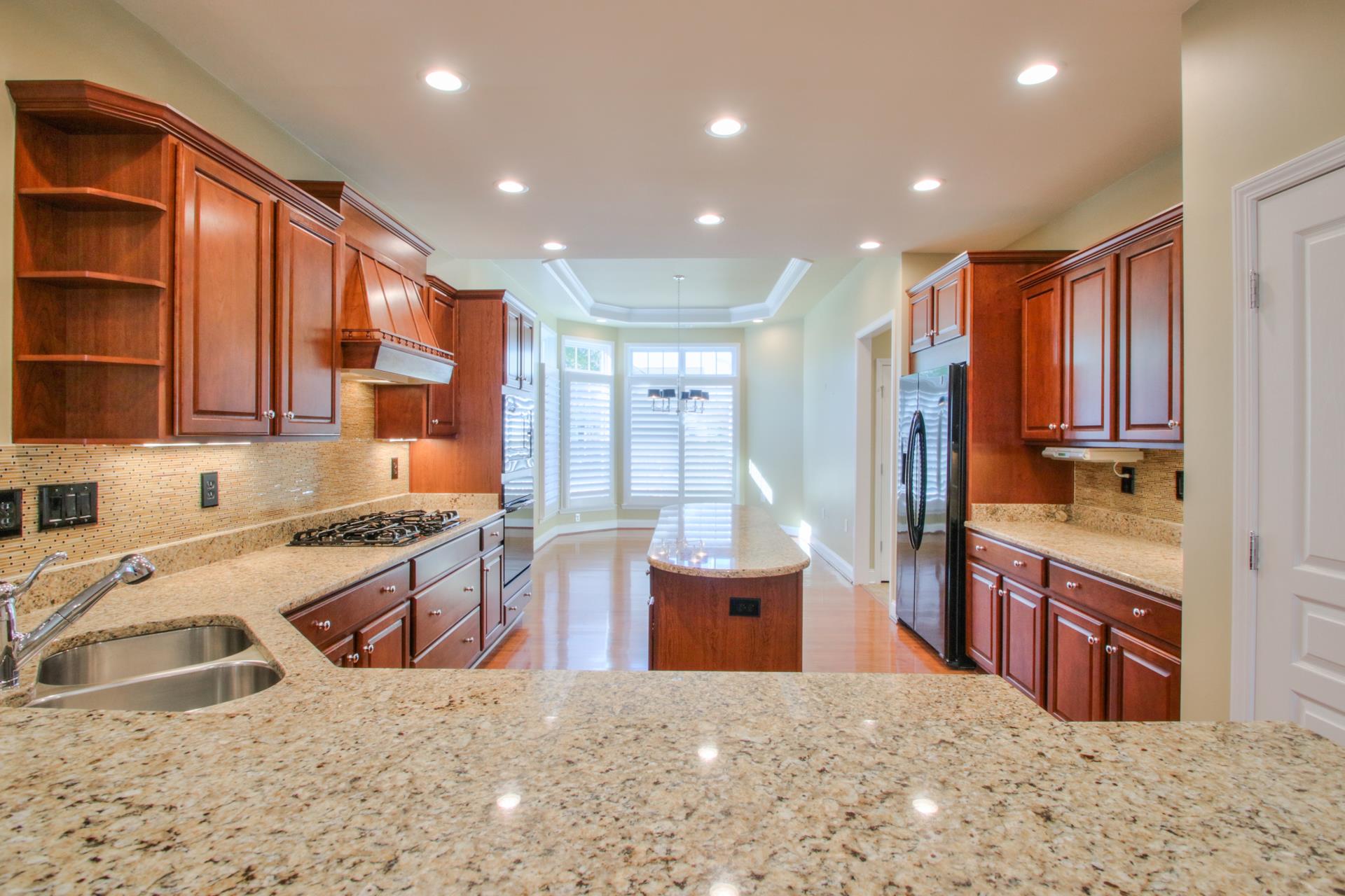 512 Bugler Road Mount Juliet, TN 37122 - Photo 5 of 30 a kitchen with stainless steel appliances granite countertop a sink stove and cabinets
