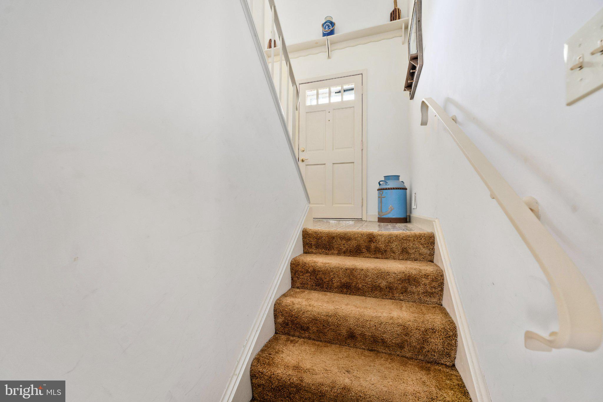 279 Harbor Drive Reedville, VA 22539 - Photo 55 of 97 Welcoming staircase to a cozy home.