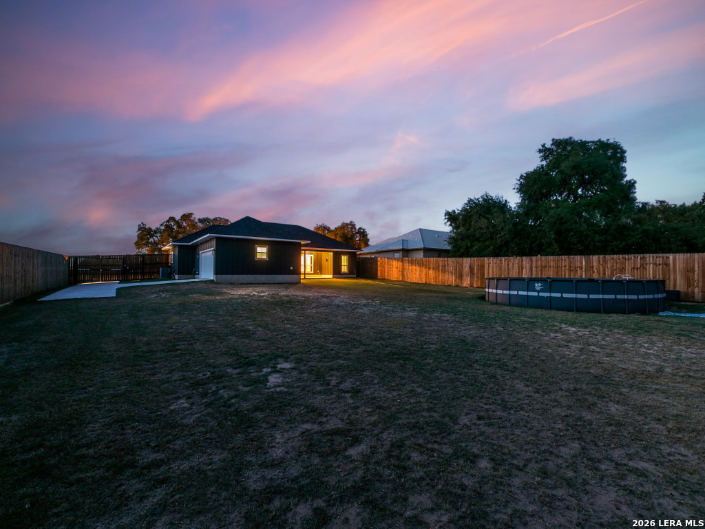 1015 Timbercrest Pleasanton, TX 78064 - Photo 25 of 26 a view of a back yard