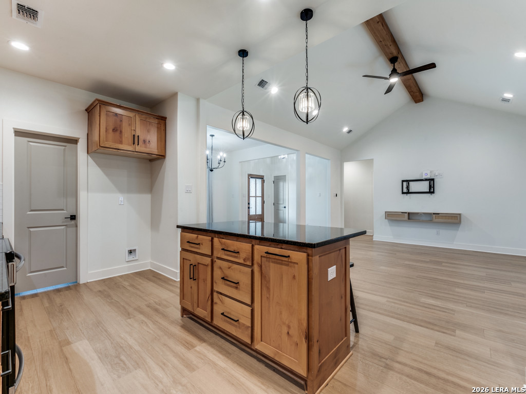 1015 Timbercrest Pleasanton, TX 78064 - Photo 10 of 26 a kitchen with stainless steel appliances granite countertop a stove and a wooden floors