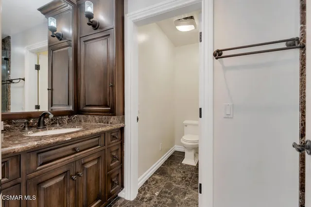 an aerial view of house with a yard