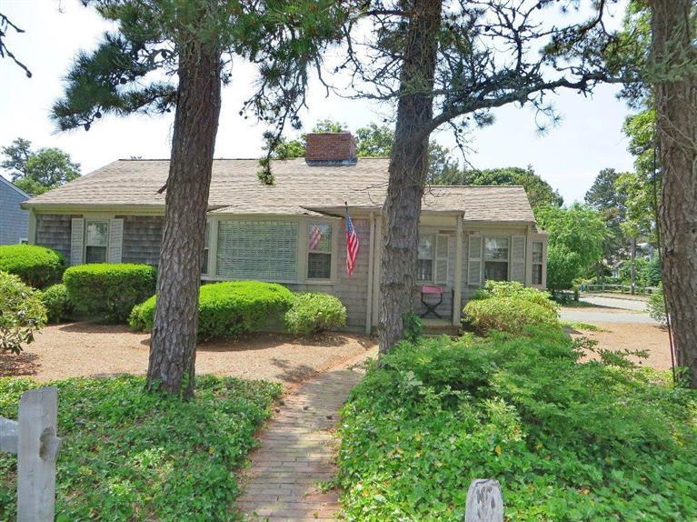 157 Lower County Road West Harwich, MA 02671 - Photo 13 of 14 a front view of a house with yard and green space