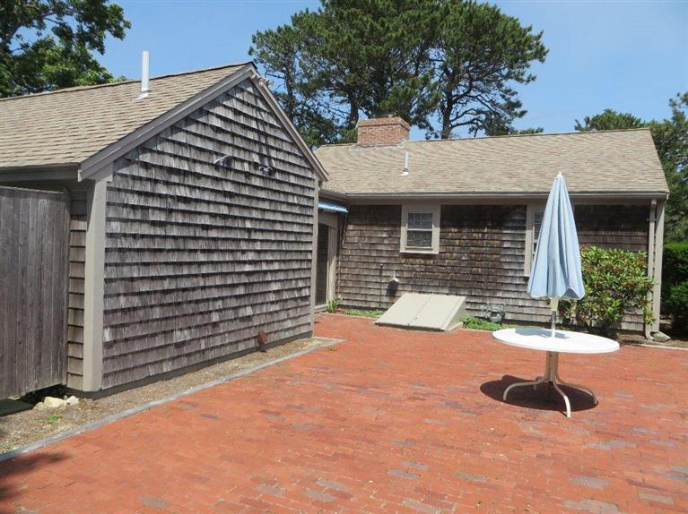 157 Lower County Road West Harwich, MA 02671 - Photo 14 of 14 a front view of a house with a yard