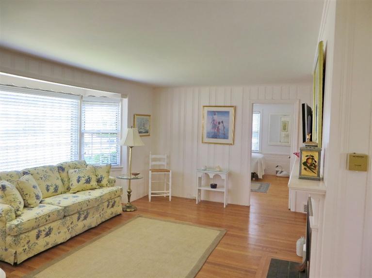 157 Lower County Road West Harwich, MA 02671 - Photo 2 of 14 a living room with furniture and a large window