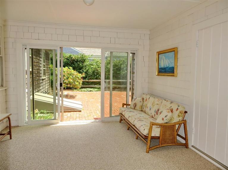 157 Lower County Road West Harwich, MA 02671 - Photo 10 of 14 a living room with furniture and a large window