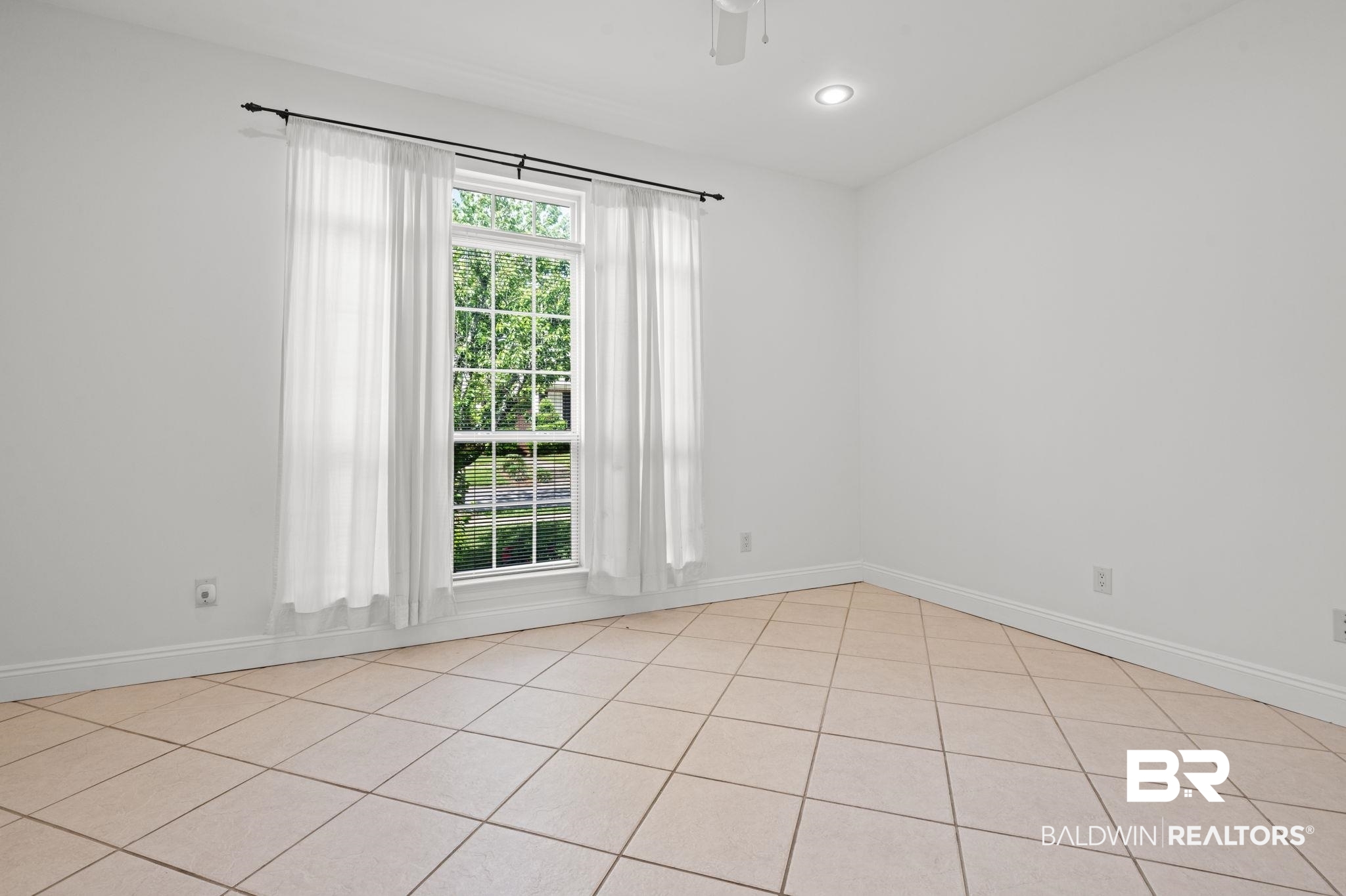 29634 St George Street Daphne, AL 36526 - Photo 41 of 47 Unfurnished room featuring light tile patterned flooring and a ceiling fan