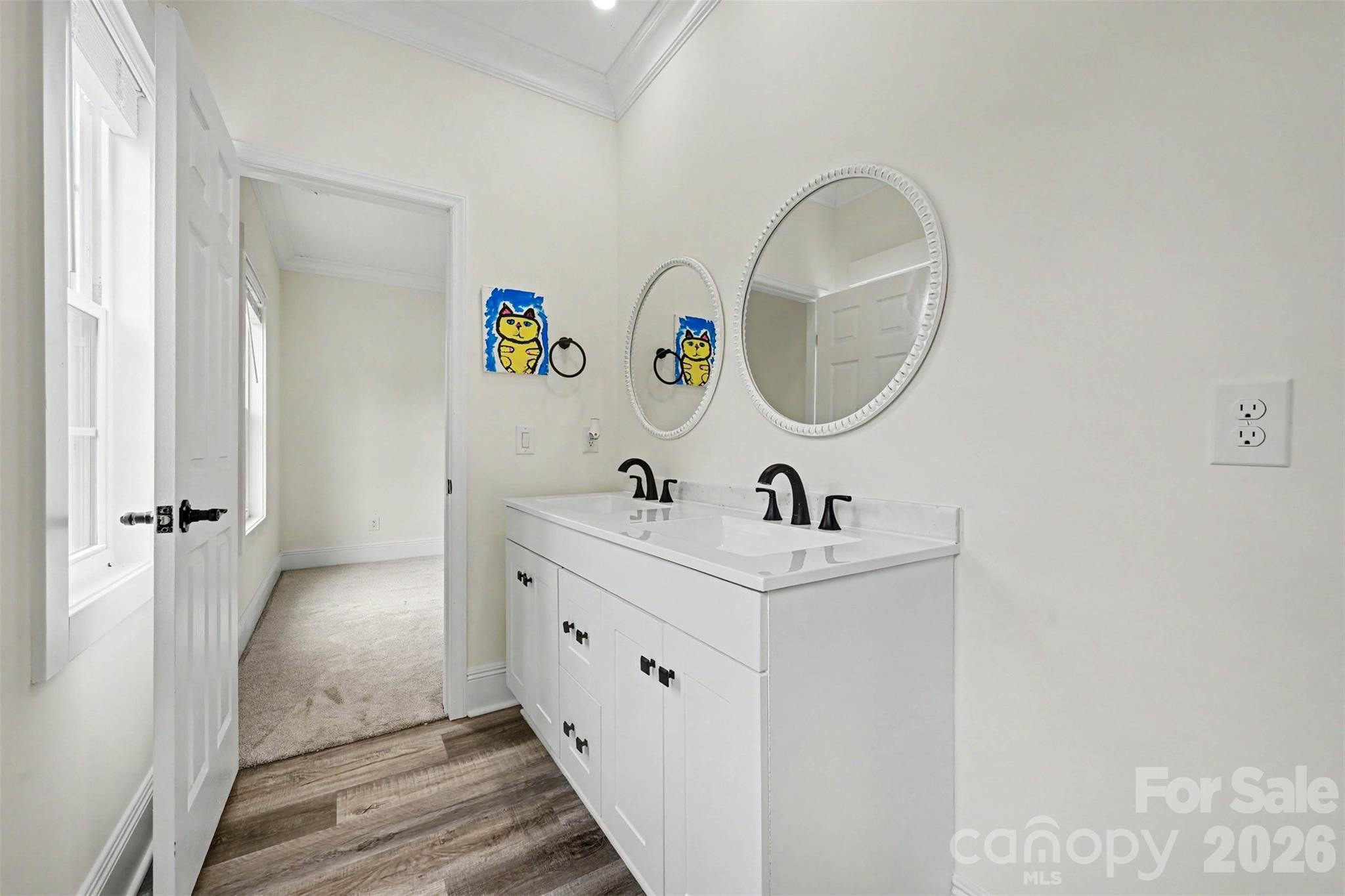 31 Ridgecrest Avenue Peachland, NC 28133 - Photo 24 of 30 a bathroom with a sink and a mirror