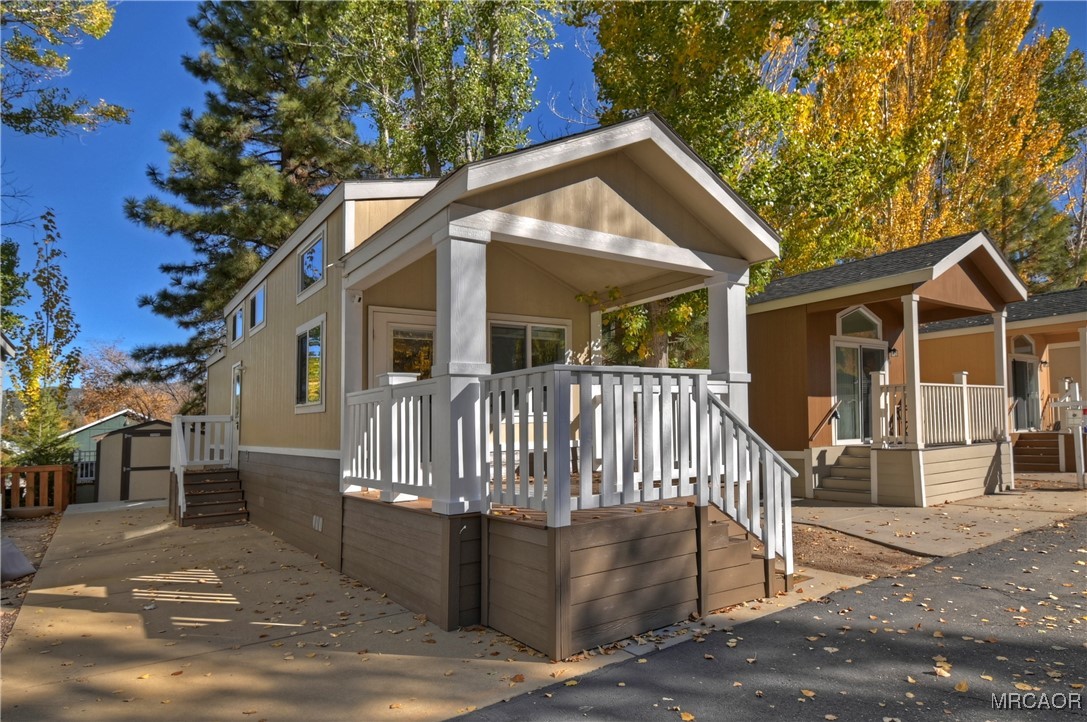 547 Alden Road, Unit RV5 Big Bear Lake, CA 92315 - Photo 31 of 34 a view of a house with a yard