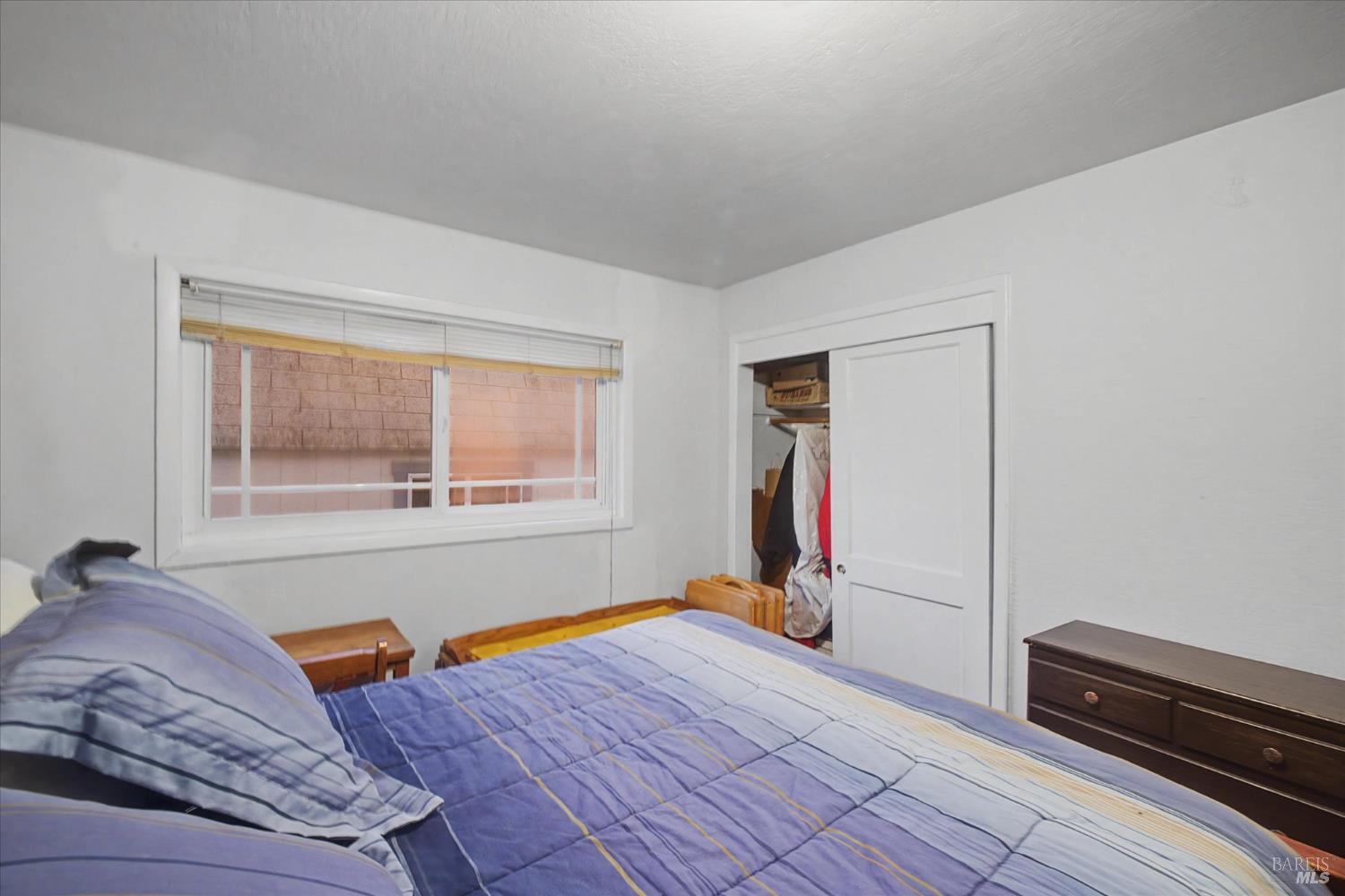 1763 E Street Napa, CA 94559 - Photo 16 of 31 a bedroom with a bed and a window