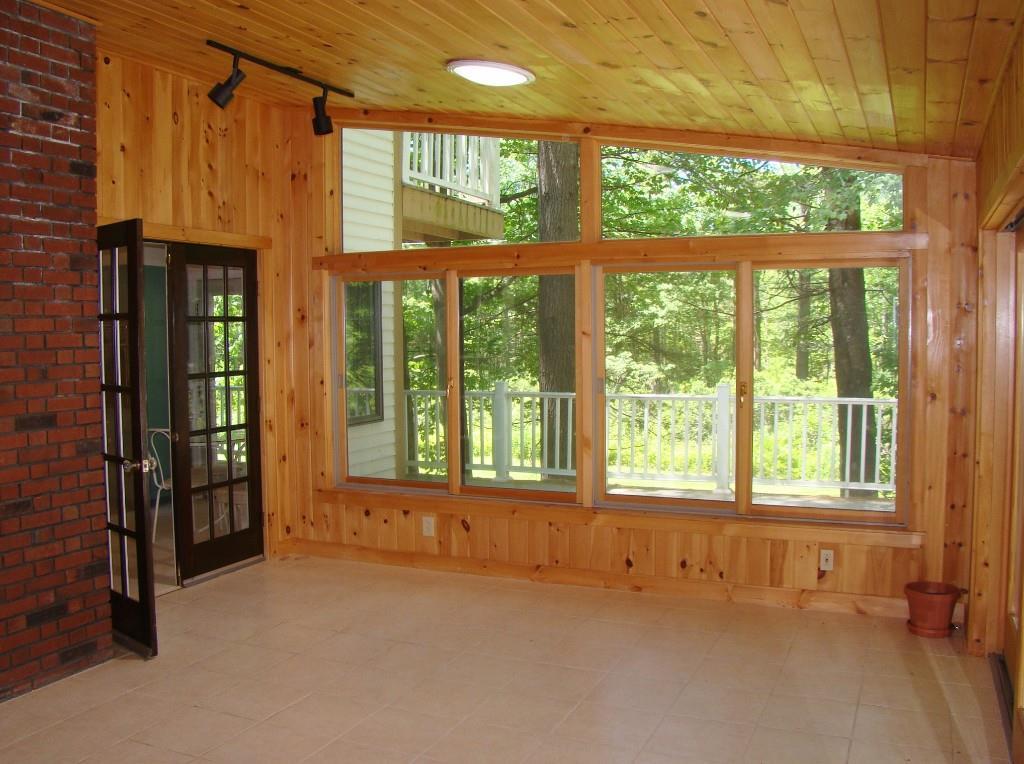 186 Cedarwood Road Auburn, ME 04210 - Photo 21 of 35 Opening to the sun room