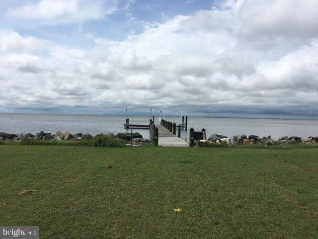 20256 Nanticoke Road Nanticoke, MD 21840 - Photo 2 of 26 a view of a city with ocean in background