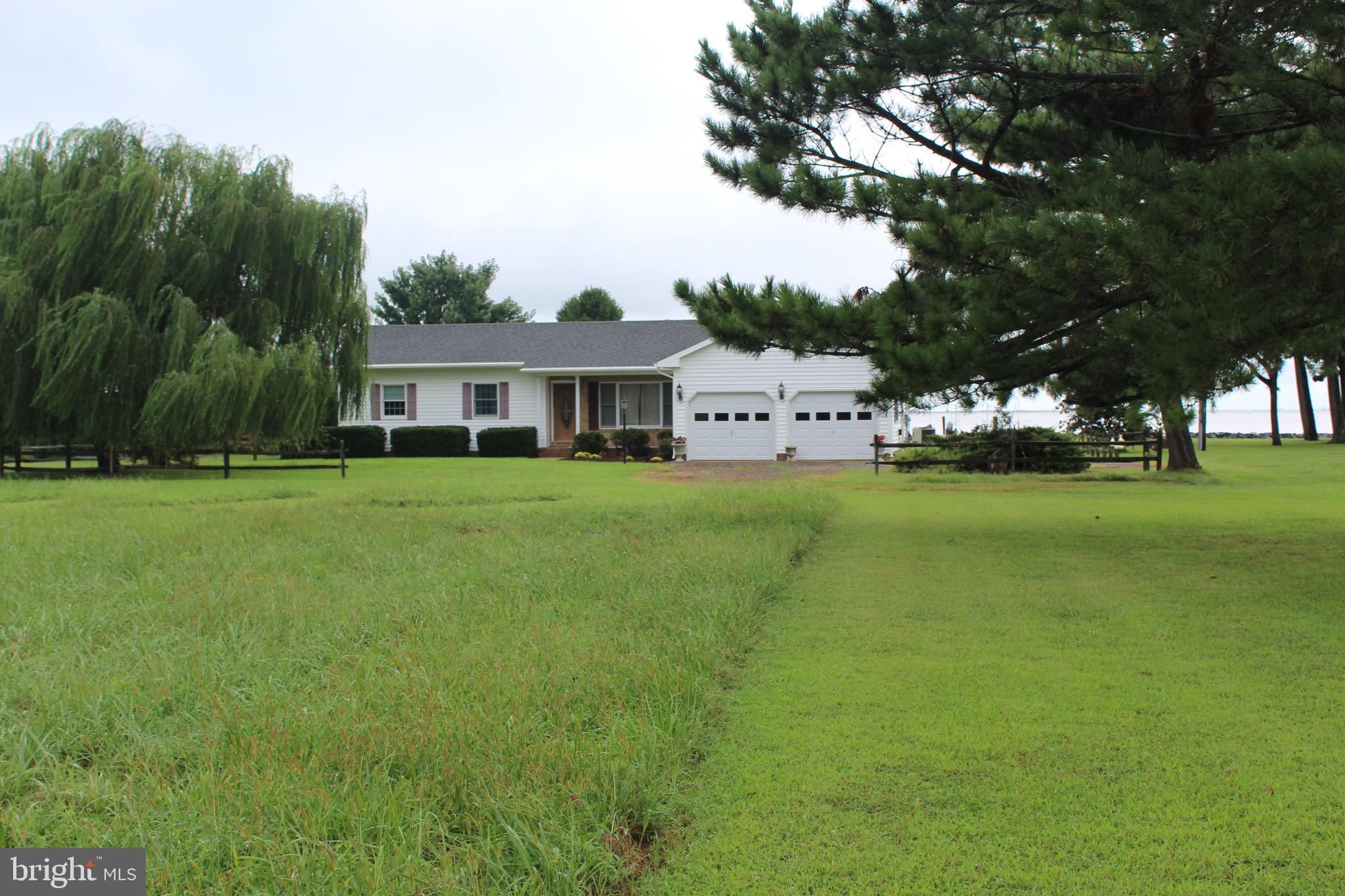 20256 Nanticoke Road Nanticoke, MD 21840 - Photo 22 of 26 a view of a house with a big yard