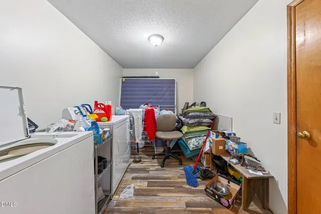 a storage room with washer and dryer