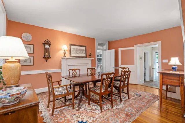 front view of a house with a bench