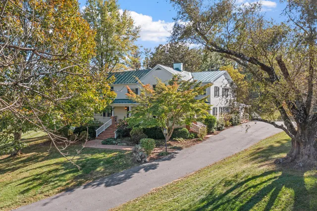 a bathroom with a toilet a sink and a bathtub