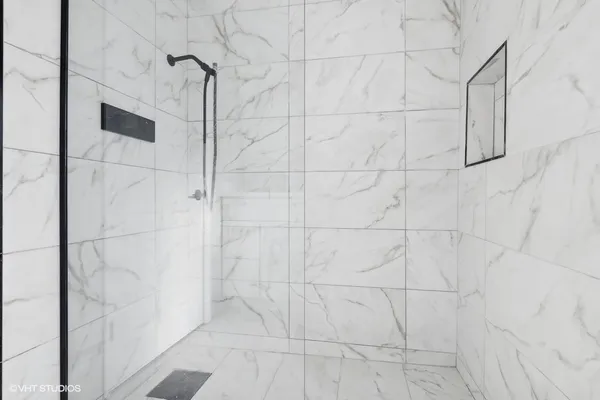 a bathroom with a toilet and a sink