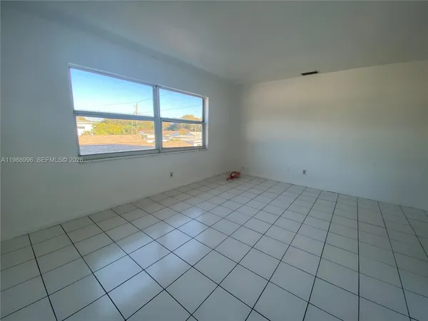 an empty room with a window