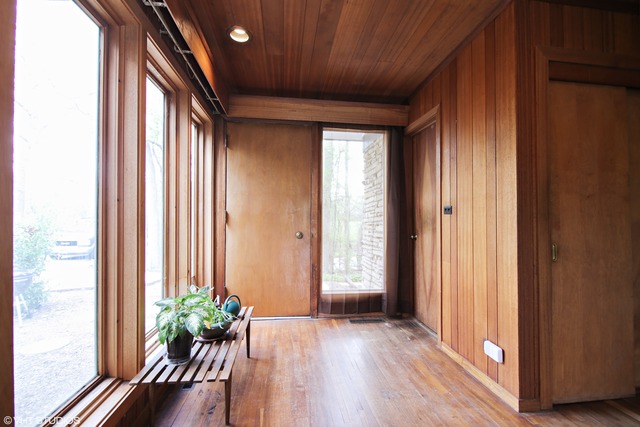 1655 Sunset Ridge Road Northbrook, IL 60062 - Photo 2 of 12 a view of an entryway with wooden floor and door