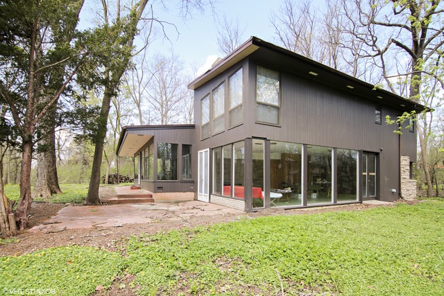 1655 Sunset Ridge Road Northbrook, IL 60062 - Photo 12 of 12 a view of a house with a yard and plants