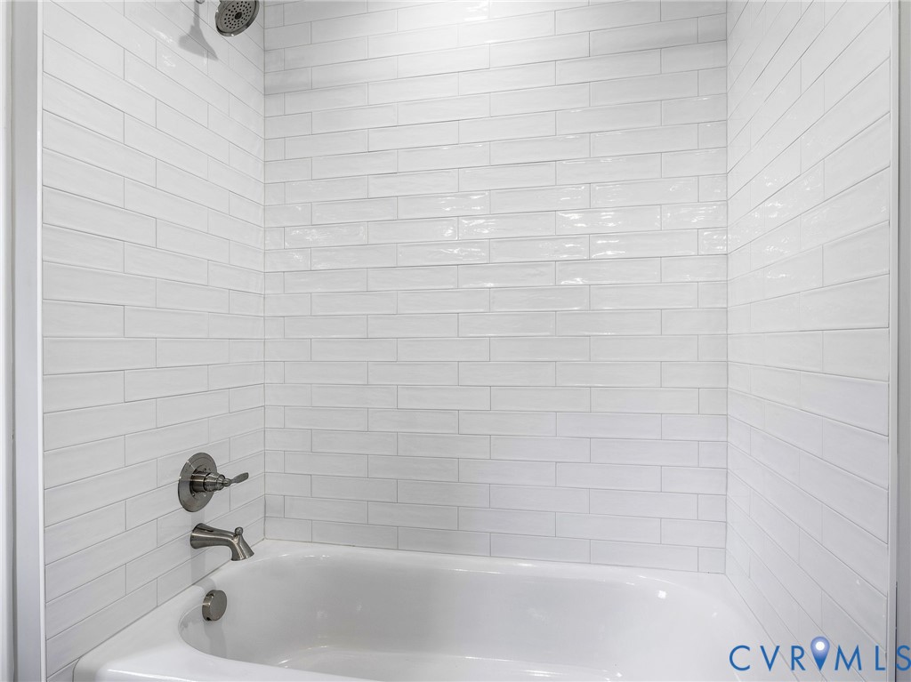 3107 Handley Road Midlothian, VA 23113 - Photo 43 of 50 Hall bathroom upstairs with tub and tile surround