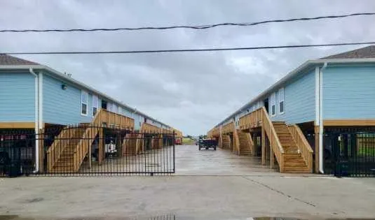 a view of a street with houses