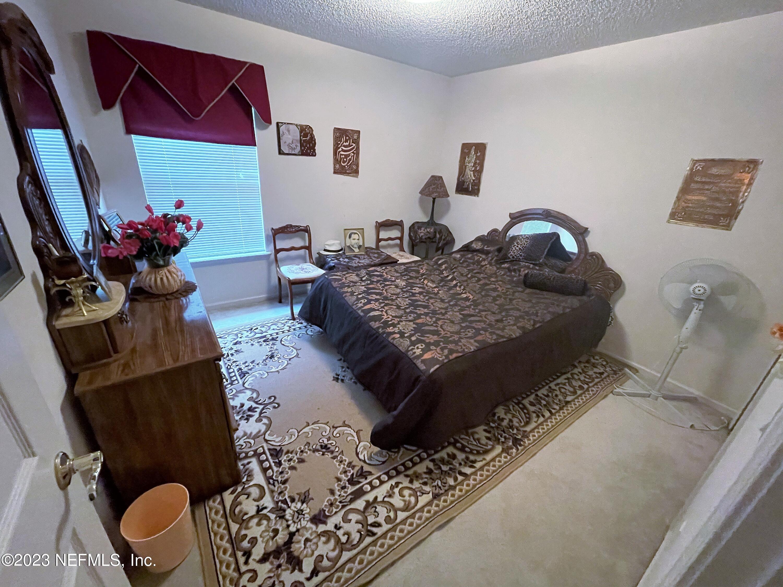 3881 Chapelgate Road Jacksonville, FL 32223 - Photo 8 of 11 Secondary Bedroom