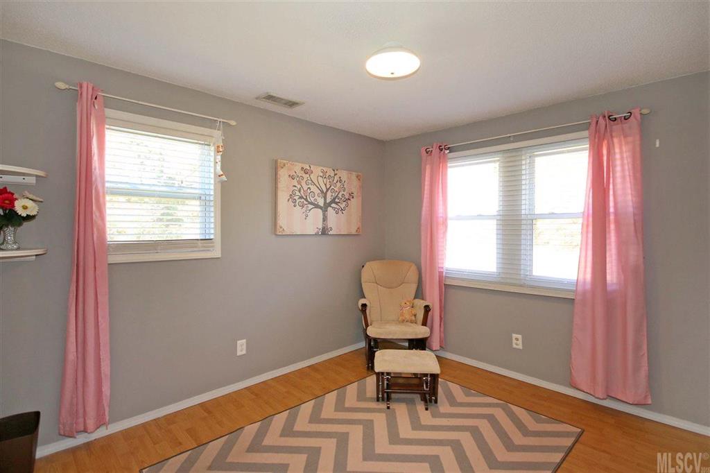 356 Kimmons Road Harmony, NC 28634 - Photo 22 of 25 a living room with furniture and a window