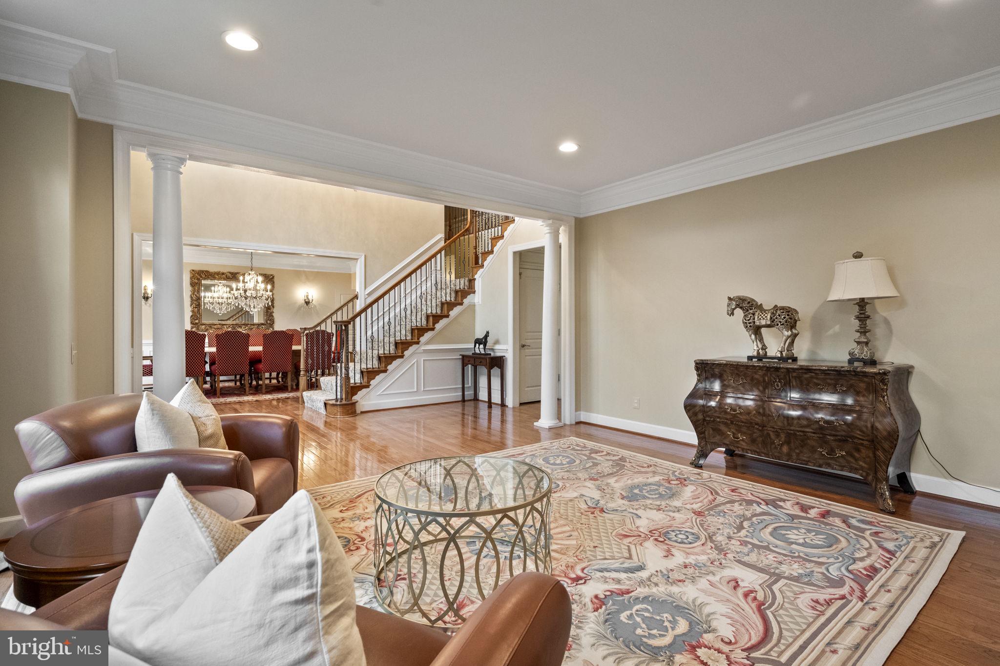 20899 McIntosh Place Leesburg, VA 20175 - Photo 22 of 69 a bedroom with furniture and a rug