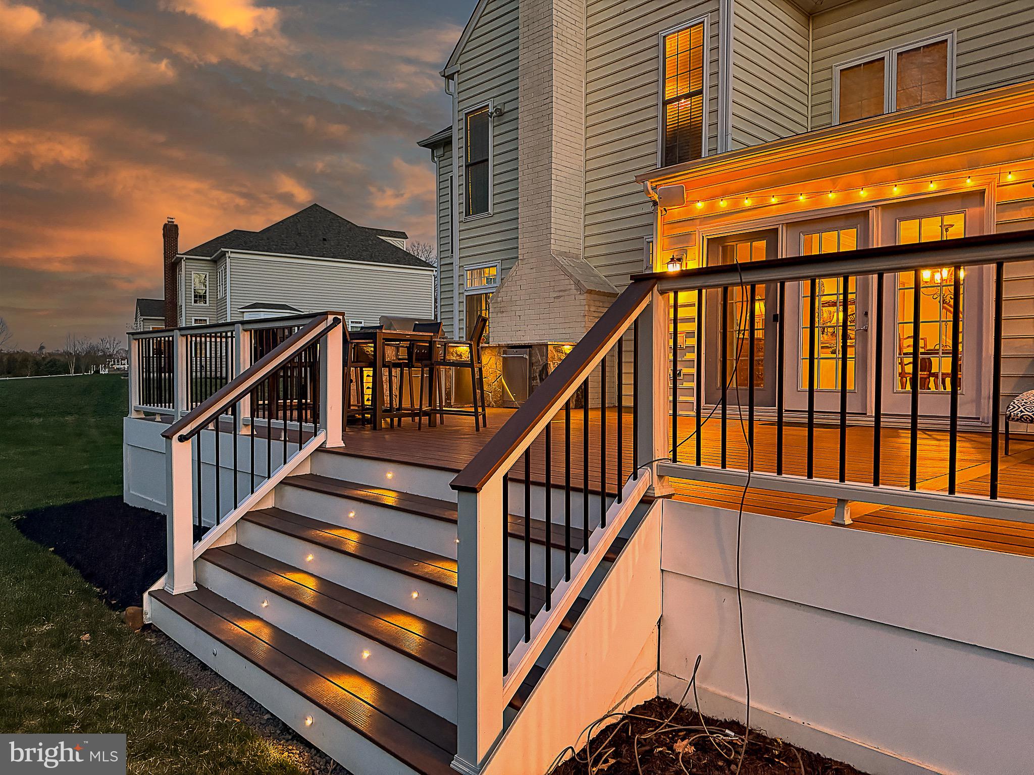 20899 McIntosh Place Leesburg, VA 20175 - Photo 47 of 69 a balcony with view of stairs and a yard