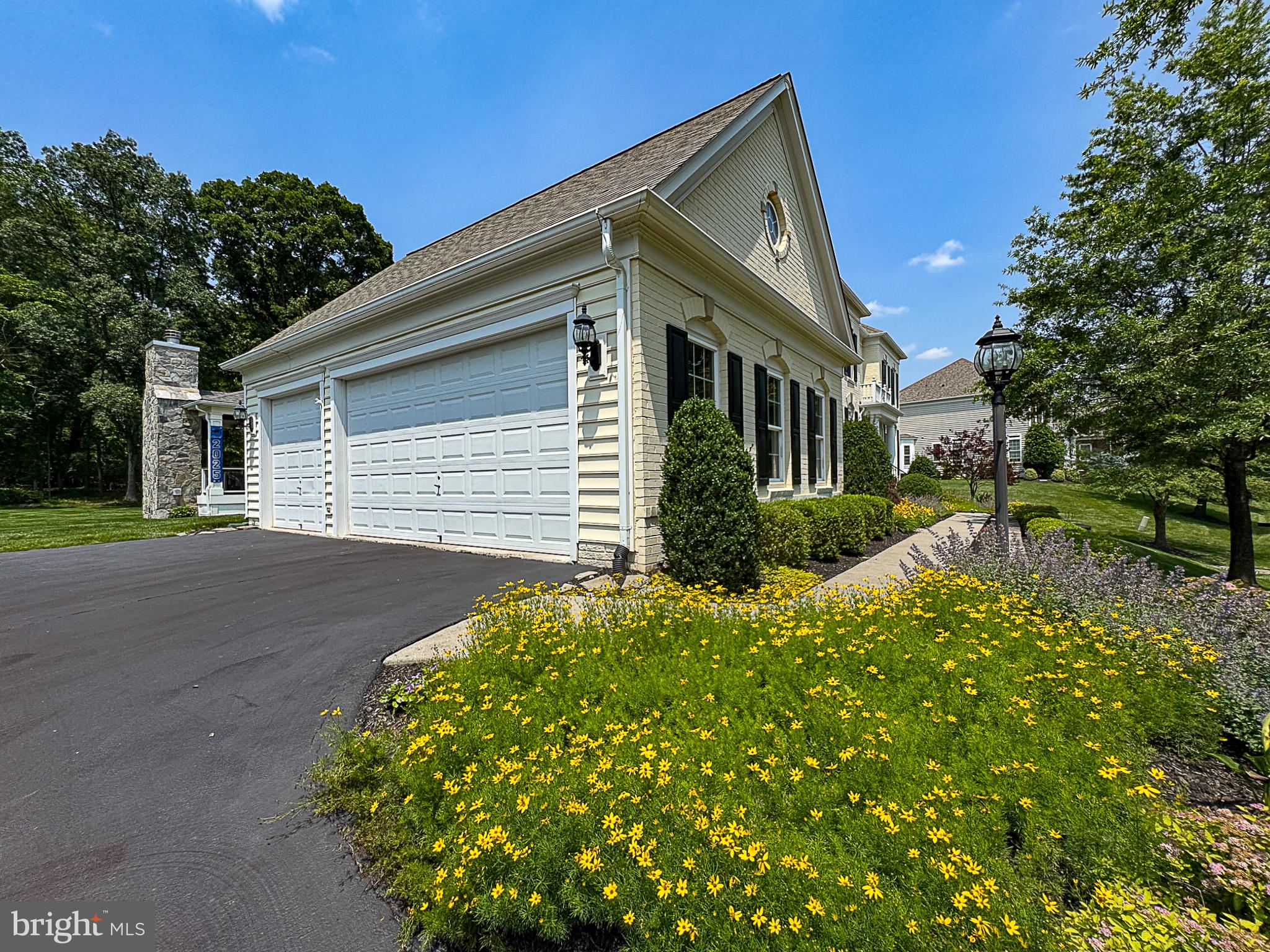 20899 McIntosh Place Leesburg, VA 20175 - Photo 48 of 69 a front view of a house with a yard