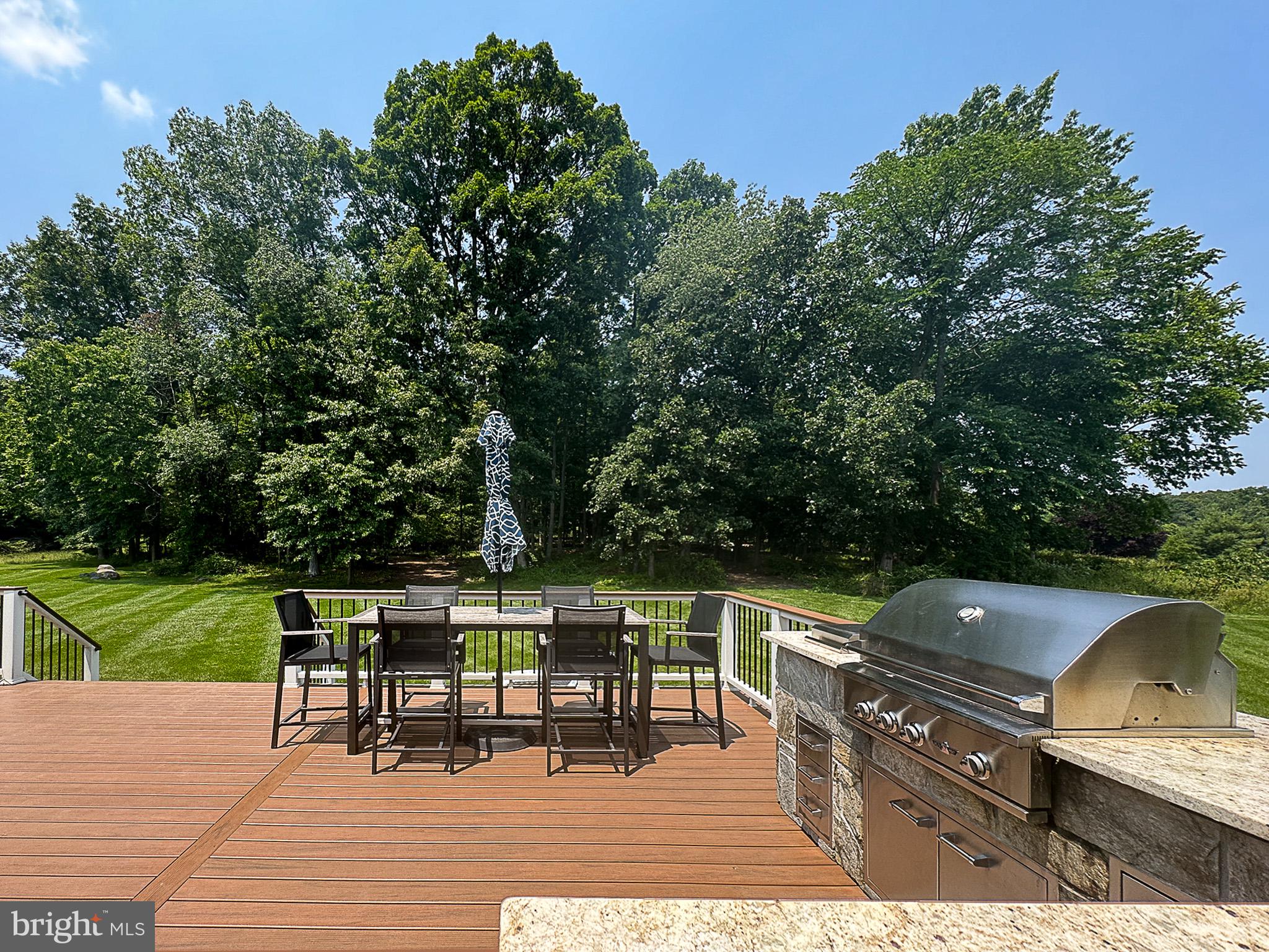 20899 McIntosh Place Leesburg, VA 20175 - Photo 56 of 69 a view of a chairs and table on the patio