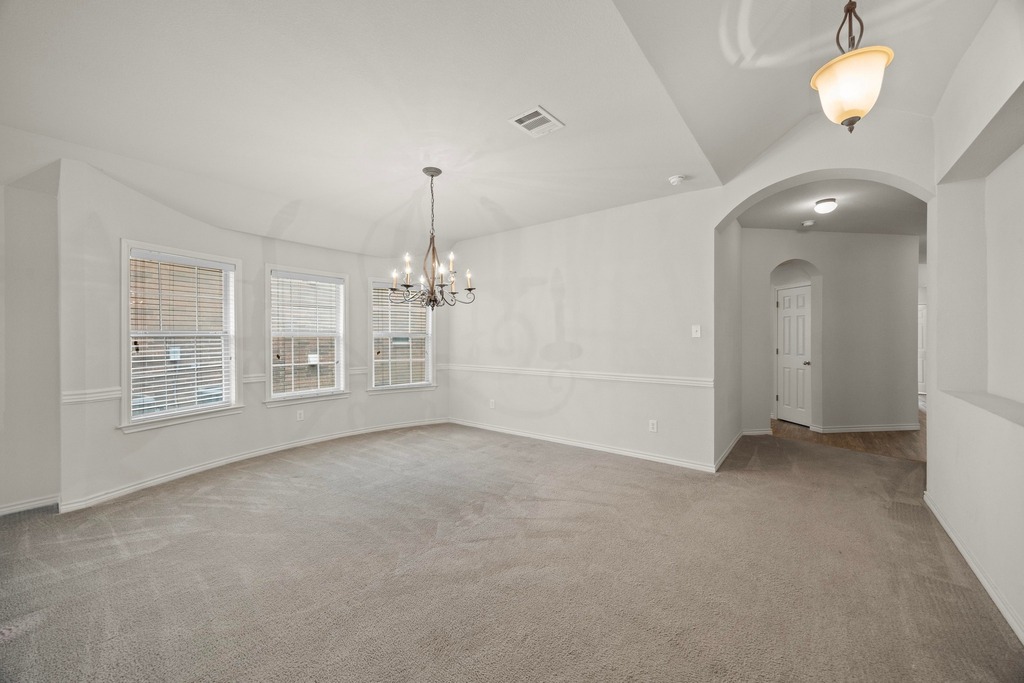 2832 Mission Tejas Drive Pflugerville, TX 78660 - Photo 14 of 30 an empty room with windows and entrance