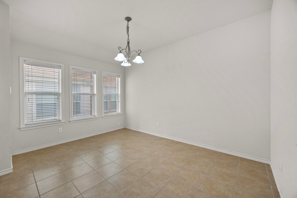 2832 Mission Tejas Drive Pflugerville, TX 78660 - Photo 19 of 30 a view of an empty room with a window