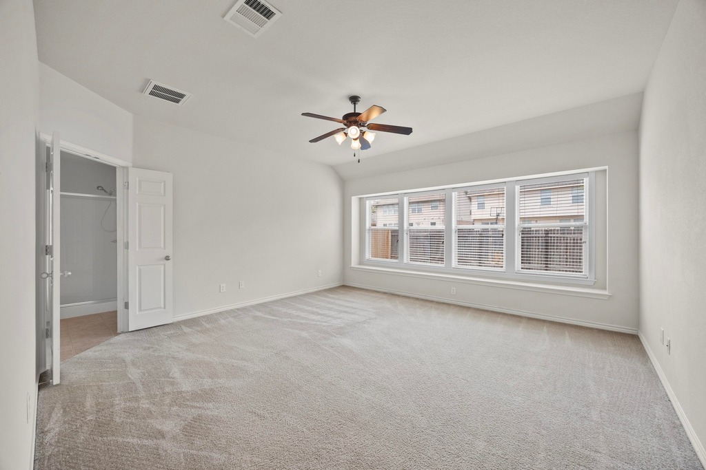 2832 Mission Tejas Drive Pflugerville, TX 78660 - Photo 20 of 30 a view of an empty room with a window