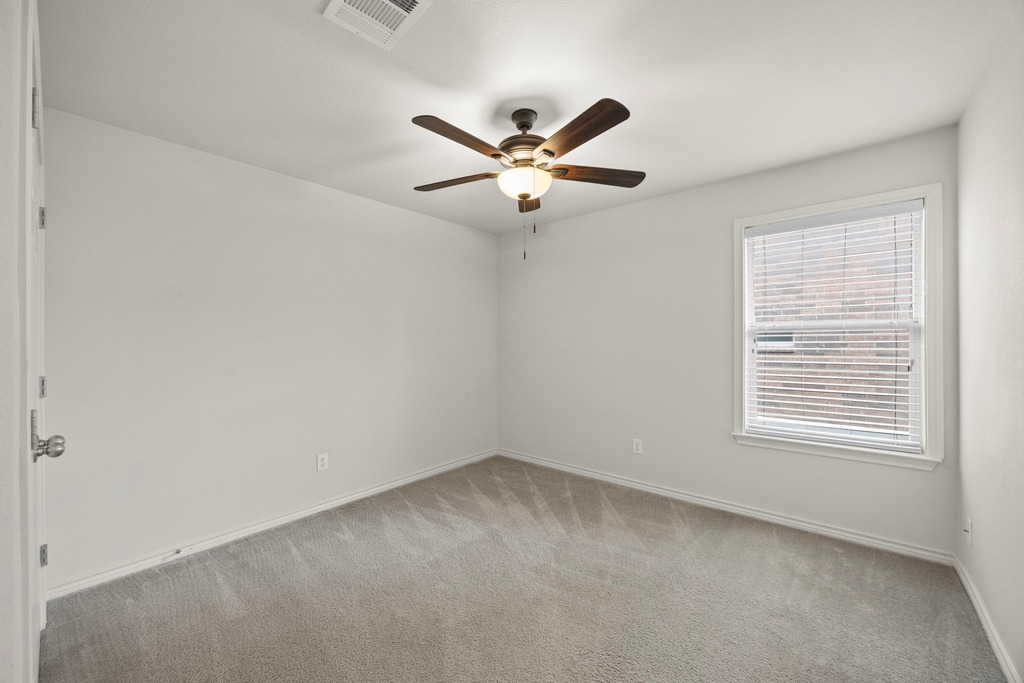 2832 Mission Tejas Drive Pflugerville, TX 78660 - Photo 24 of 30 a view of an empty room with a window