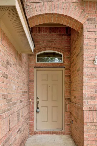 a front view of a house with an outdoor space