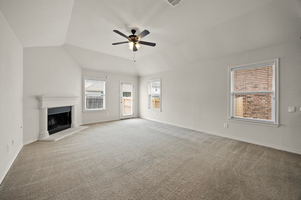 2832 Mission Tejas Drive Pflugerville, TX 78660 - Photo 5 of 30 a view of empty room with a fireplace