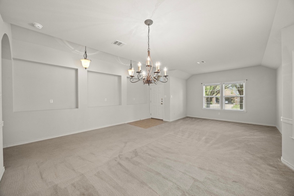 2832 Mission Tejas Drive Pflugerville, TX 78660 - Photo 10 of 30 a view of a chandelier fan and a chandelier fan in a room