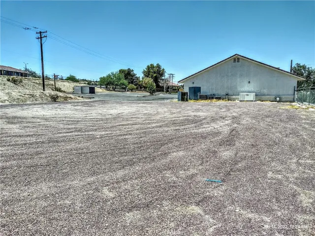 a view of a house next to a yard