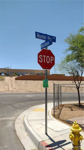 a view of a street with an entrance and door