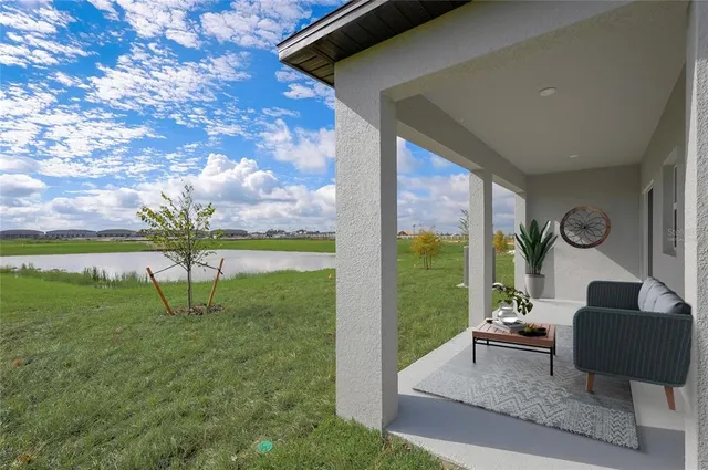 a house view with garden space and outdoor seating