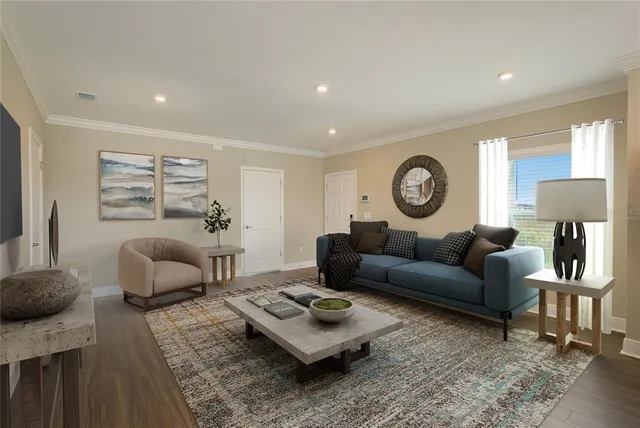 a living room with furniture and a window