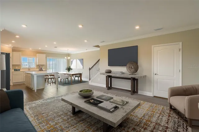 a living room with furniture and a table