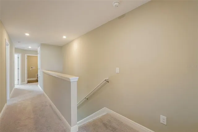 a view of hallway with stairs